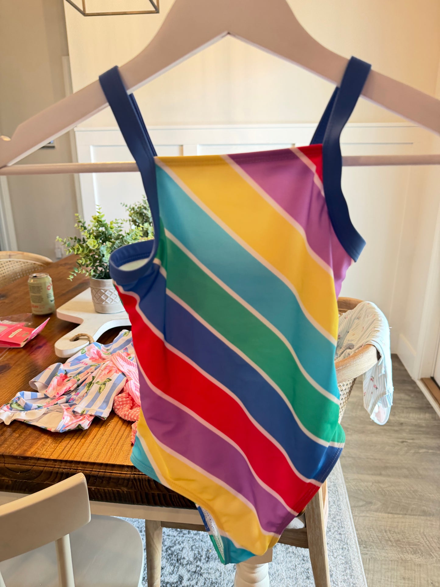 CONSIGNMENT ITEM: Rainbow Swimsuit size 6/7- runs like size 5(NWOT)